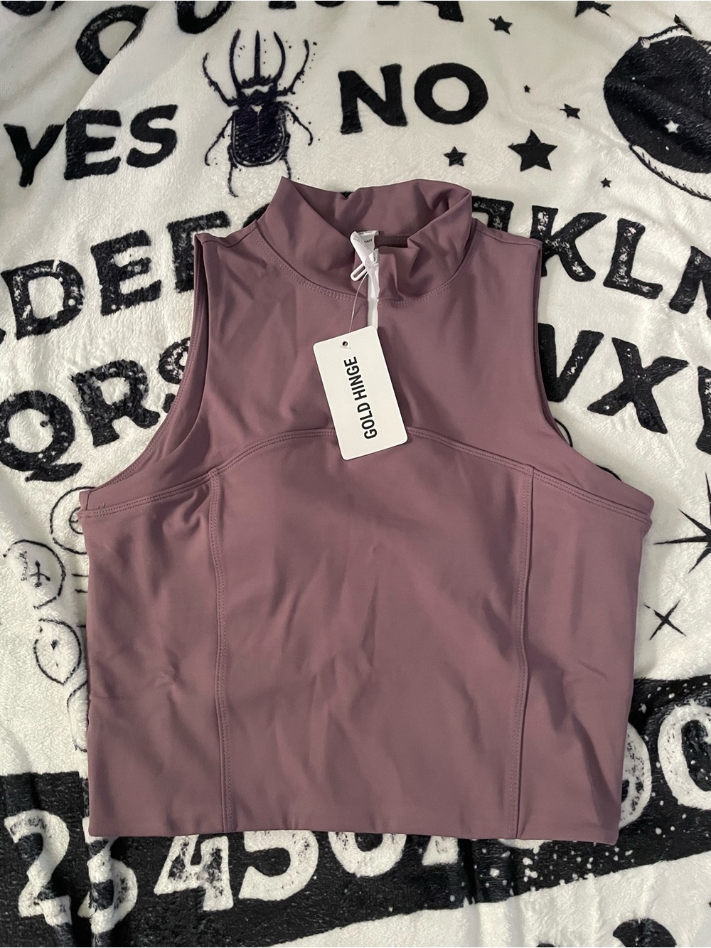 GOLD HINGE
Day To Night Quarter-Zip Sleeveless Top